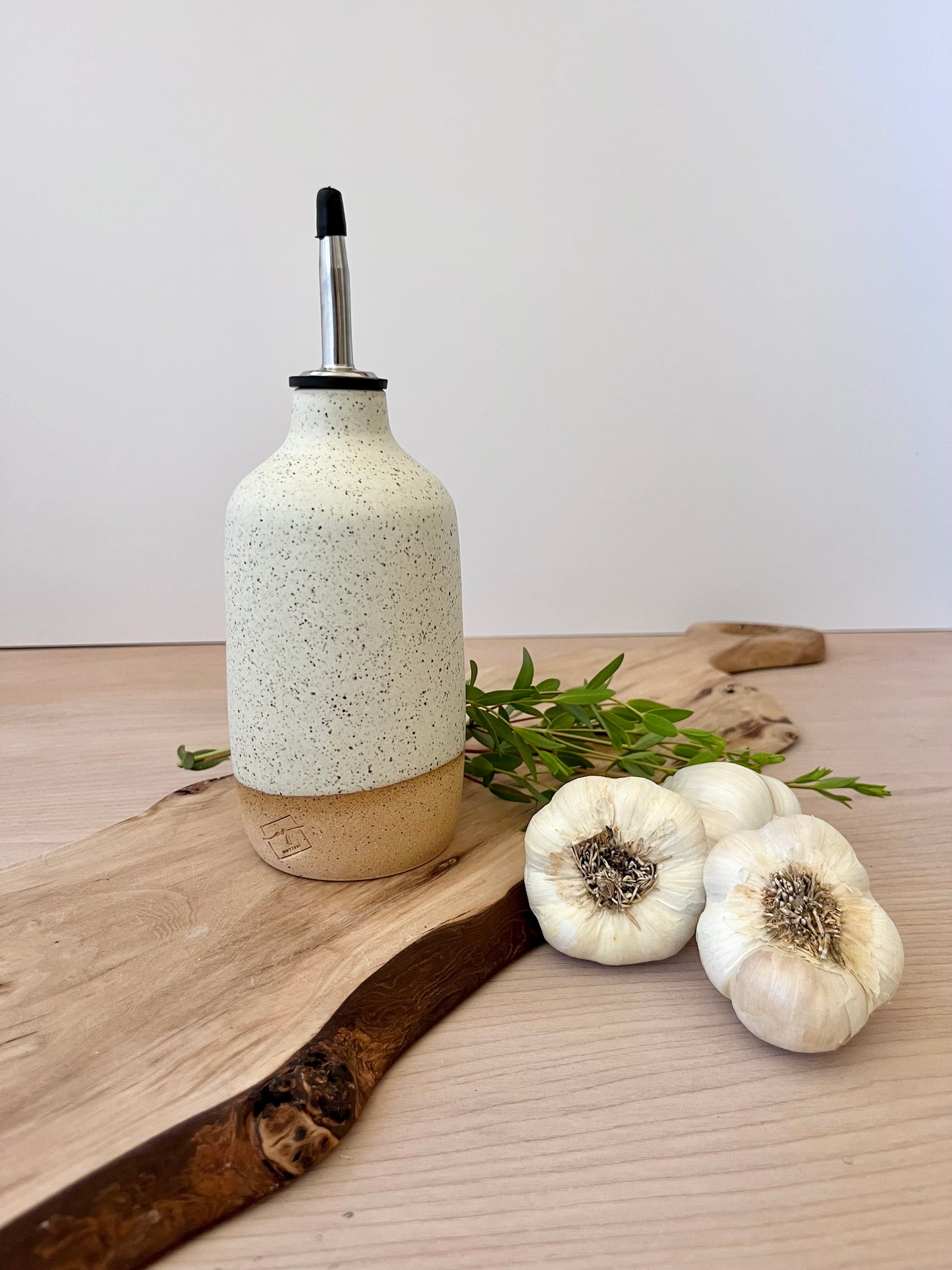 Olive oil dispenser, speckled cream