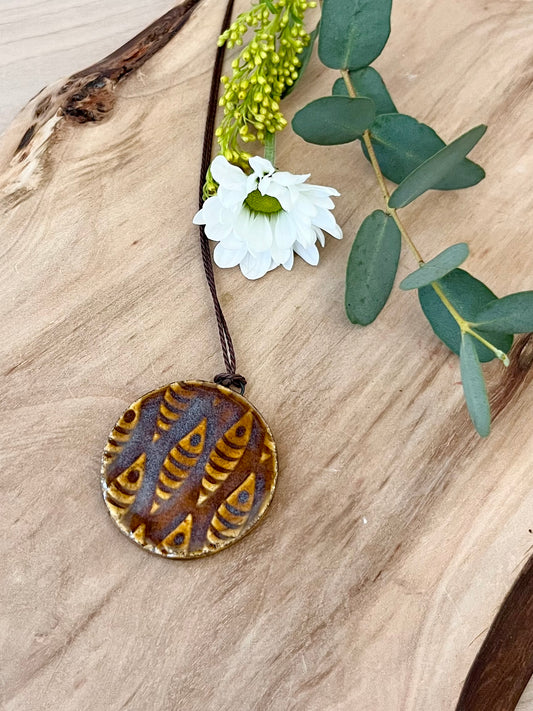 Pendant, Fish disc