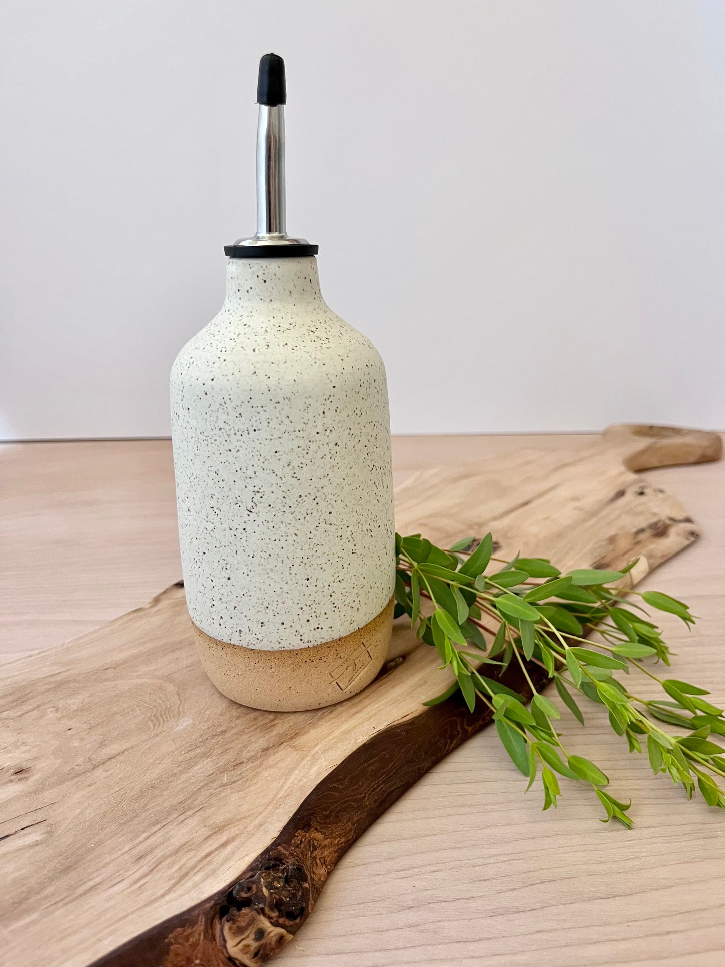 Olive oil dispenser, speckled cream
