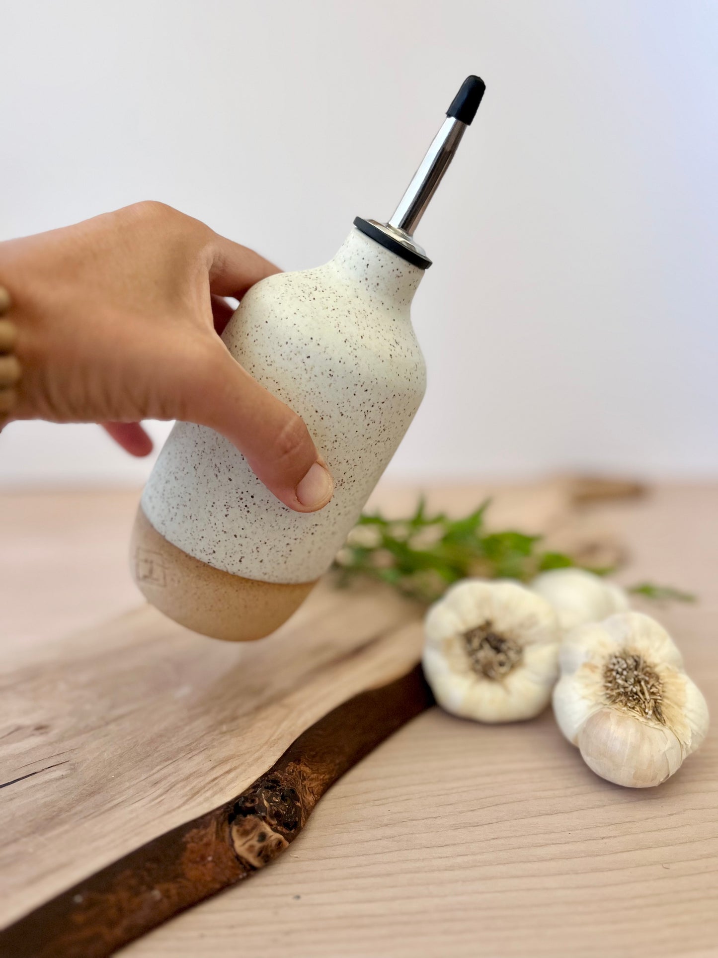 Olive oil dispenser, speckled cream